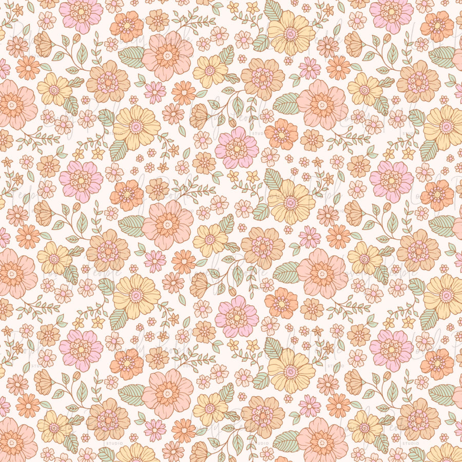A fabric with a floral pattern featuring various colors such as pink, green, and yellow.